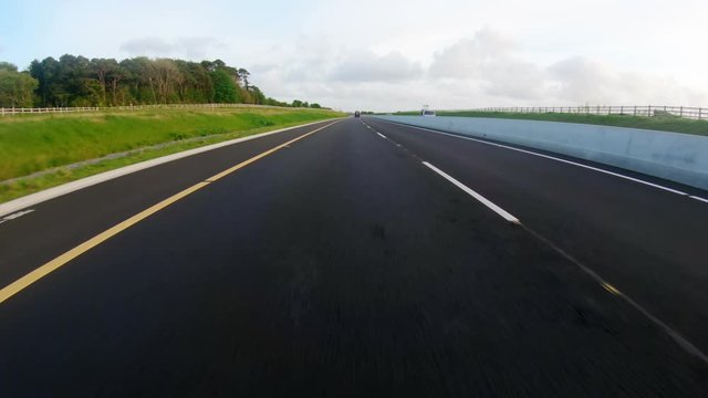 Speedy vehicle moving on a country road