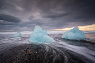 The famous Diamond beach in South Iceland. Giant ice gems on the black lava beach, placed near Jokulsarlon glacier lagoon.