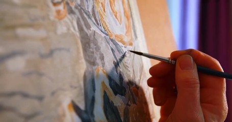 Female painter painting on a canvas at home - Powered by Adobe