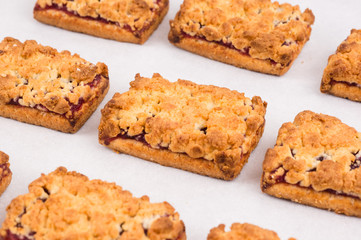 Freshly baked homemade cookies with jam in a row. Balanced nutrition, proteins and carbohydrates, cereals