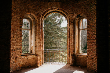 old brick destroyed building. Ruined walls and windows