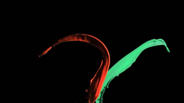 Turquoise and red lines in super slow motion merging
