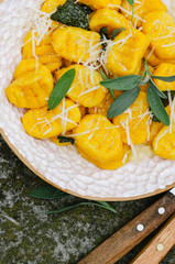 Pumpkin gnocchi with parmesan and sage.