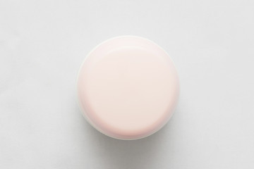 Jar with a pink lid, background, copy space, top view