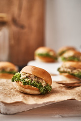 Tuna mini burger on table .