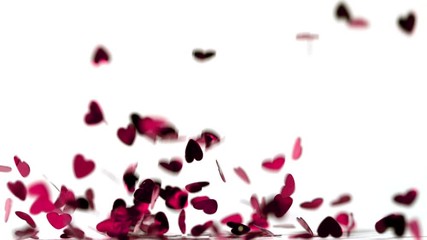 Pink heart confetti falling down