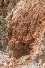 Landslide zone on Black Sea coast. Rock of sea rock shell. Zone of natural disasters during rainy season. Large masses of earth slip along slope of hill, destroy houses. Landslide - threat to life