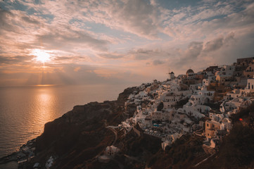 Sunset over the sea and clouds. Santorini, Greece