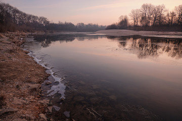 Obraz premium sunrise over the river