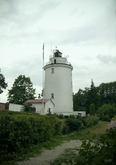 Fototapeta na wymiar The Suurupi Peninsula Rear Upper lighthouse in the village Suurupi in Estonia. Historic landmark on Estonia's coastline since 1760.