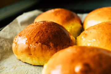 Freshly baked burger buns close up