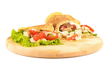 Pancake made from oatmeal, oiled with yogurt and stuffed with chicken fillet, lettuce and tomato.