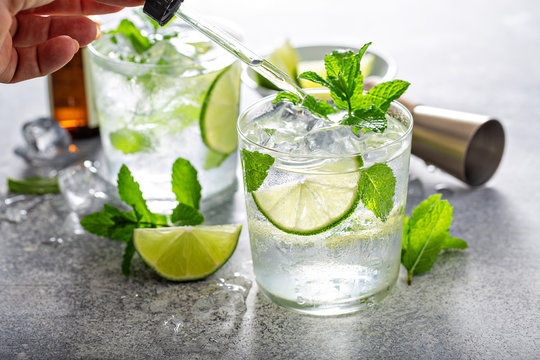 Refreshing Summer Mojito Cocktail With Aromatic Bitters In A Dropper