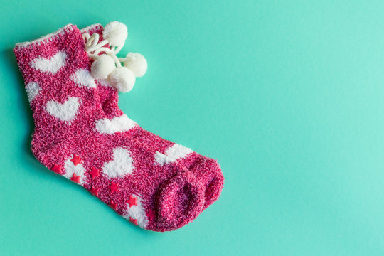 Super Soft Warm Fuzzy Plush Cozy Socks With Hearts, Home Clothes, Copy Space.