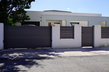 Aluminum modern home grey gate and portal of suburb house