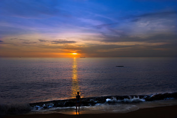 Silhouette and sunset over the ocean