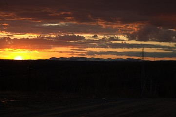 Orange sunset at the beginning of the Polar summer