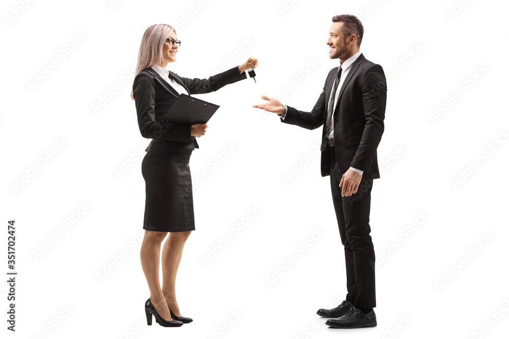 Poster businesswoman giving car keys to a businessman