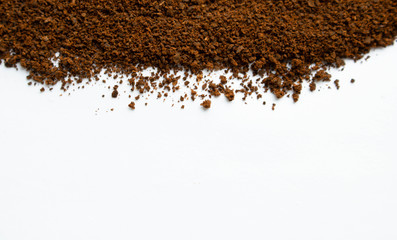 Image of ground instant coffee on a white background. Space for your text