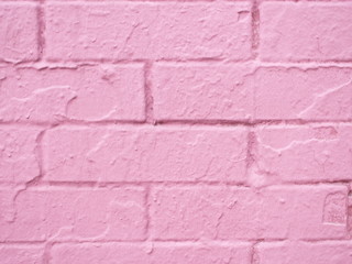 Rose painted brick wall, textured background