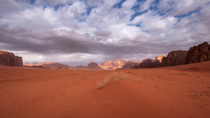 Fototapeta na wymiar Wadi Rum desert under a beautiful sky with clouds
