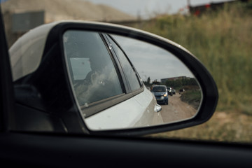 Fototapeta premium side view mirror in the car