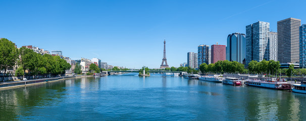 Fototapeta na wymiar Panoramic of Eiffel Tower, Seine river and Statue of Liberty in Paris, France.