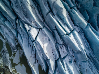 Fototapeta premium Aerial view of melting glacier. Svinafelljokull glacier in Skaftafell National Park, Iceland