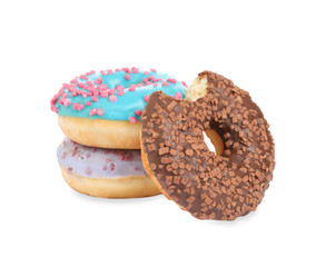 Sweet tasty glazed donuts on white background