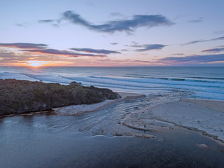 Fototapeta premium Sunrise over Lake Cathie Entrance Opening