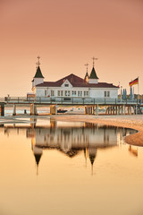 morning time at baltic sea beach and sight Ahlbeck pier in sunrise - obrazy, fototapety, plakaty