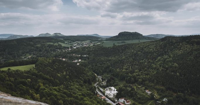 4k moving Timelapse Video clip towards elbe river and Lilienstein in saxon switzerland from fortress koenigstein. Aerial village view in Saxony region in Germany.