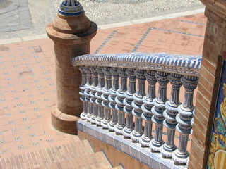 Ceramic handrails on the Spanish Square in Seville on a sunny day.