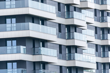 Abstract fragment of modern architecture made of glass and concrete.