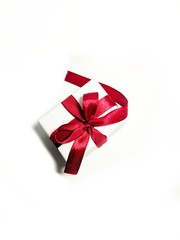 gift box with red ribbon isolated