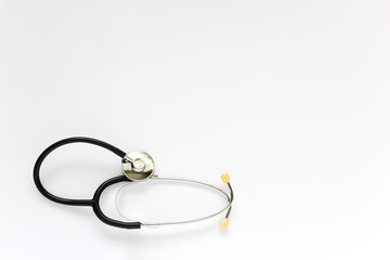 The stethoscope is on a white background. Space for text. White background.