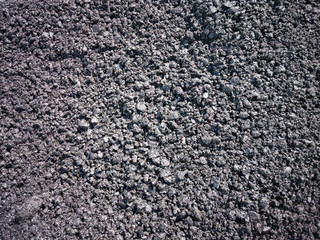 black tar for background, asphalt mass ready for laying, texture black background