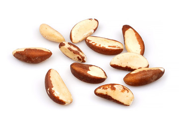 Obraz premium A pile of Organic Brazil nuts peeled isolated on white background