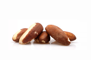 Organic Brazil nut isolated on white background.