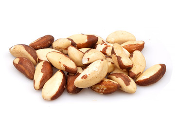 Organic brazil nuts isolated on white background