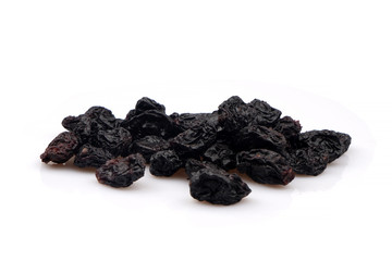 Organic Black raisins on white background