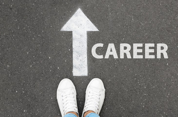 Woman standing near arrow on asphalt, top view. Career choice concept