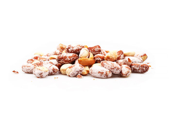 Organic Dried salted peanuts on white background