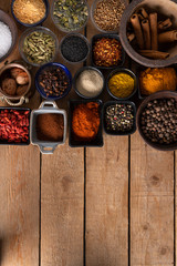 Variety of Spices on a wooden surface