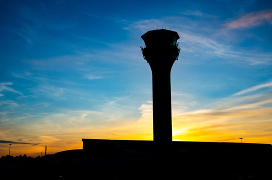 London Luton Aiport's Control Tower in the sunset. Silhouette picture.