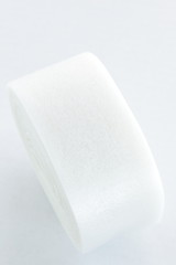 Plastic tape for housing good on white background