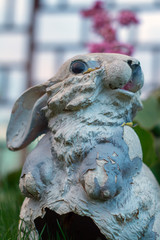 Obraz na płótnie Canvas Garden figurine on grass background close-up