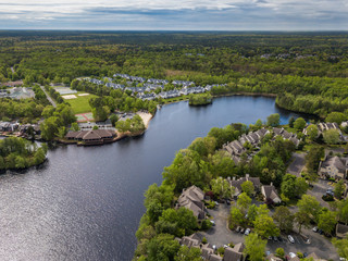 Fototapeta na wymiar Aerial photo of the lake in the countryside living community