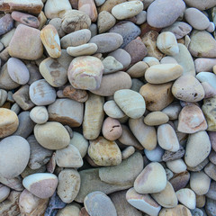Close up of rounded and polished beach rocks