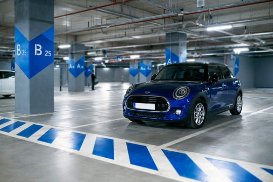 Parliament Blue colored Mini Cooper Countryman Brand car in the parking lot of Hilltown Shopping mall Izmir Mavisehir Turkey.